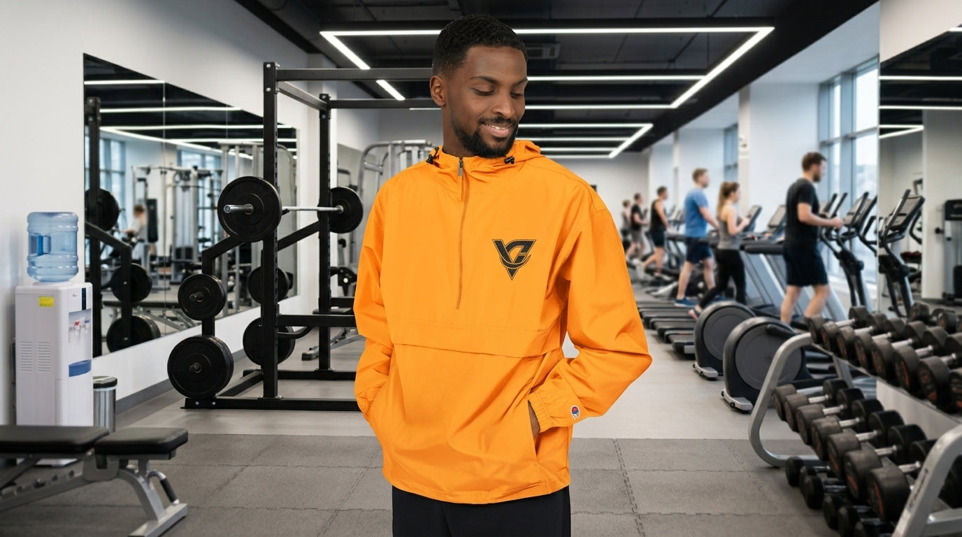 Packable Anorak Jacket — Lightweight Orange Windbreaker with Subtle Chest Logo
