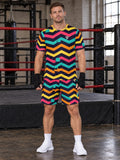 Combat Sports Electric Mango Chevron Rush Men's Athletic Shorts with Pockets - front view