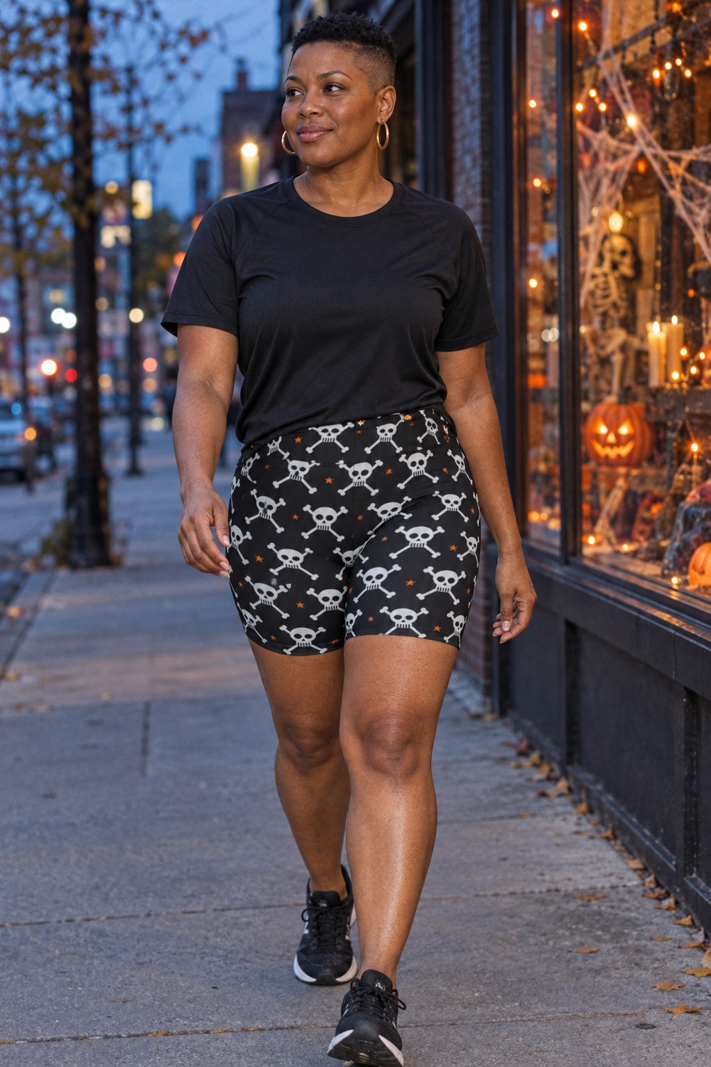 Halloween Graveyard Grey Skull & Crossbones Women's Biker Shorts on a model, second view