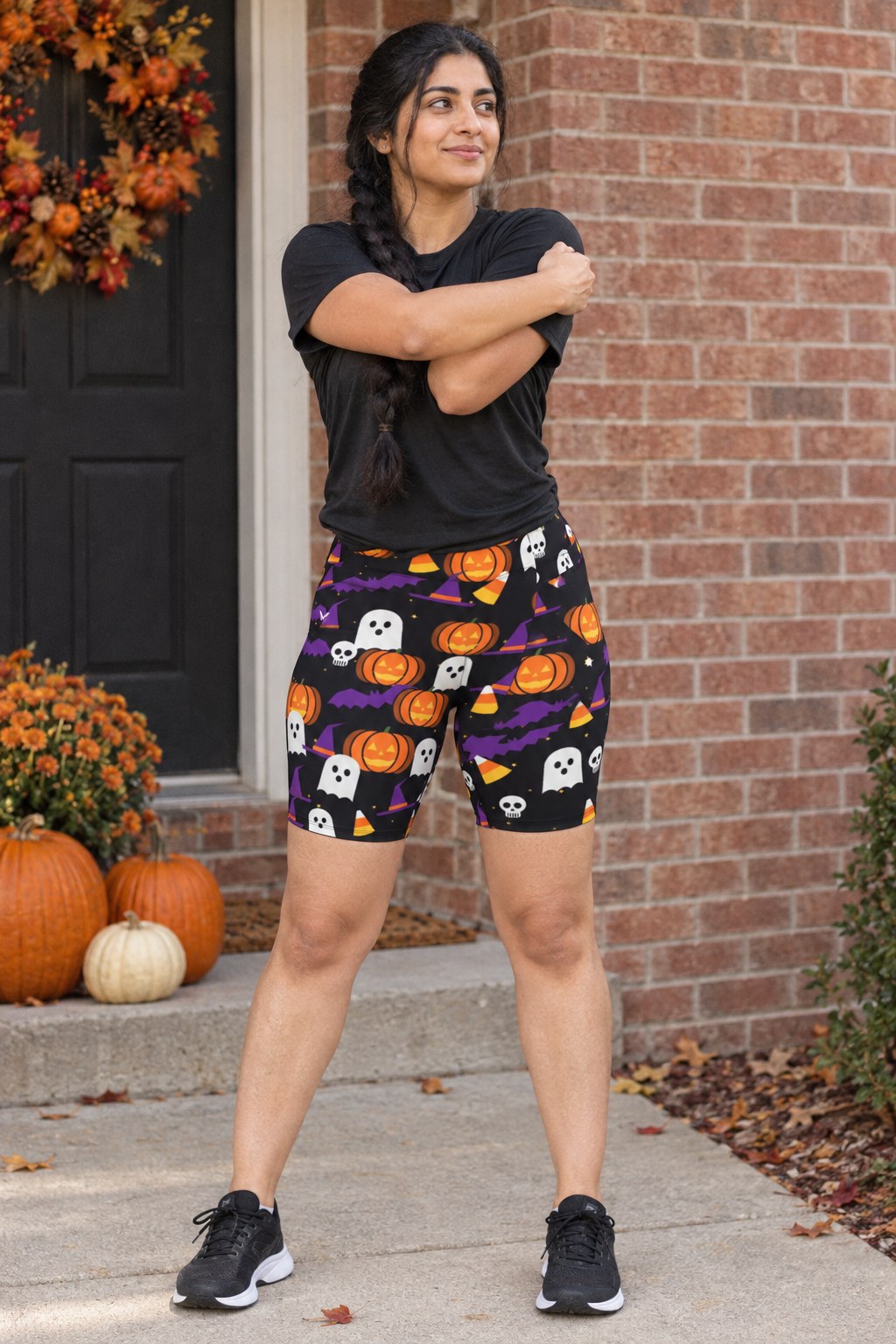 Halloween Midnight Pumpkin Spooky Mix Women's Biker Shorts worn by a model