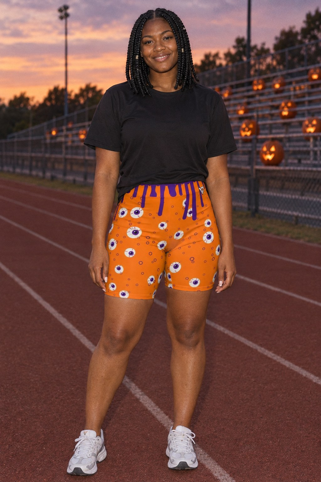 Halloween Pumpkin Orange Slime Drip Women's Biker Shorts worn by a model