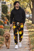 Halloween Candy Corn Haunted Moon Men's Joggers worn by a model