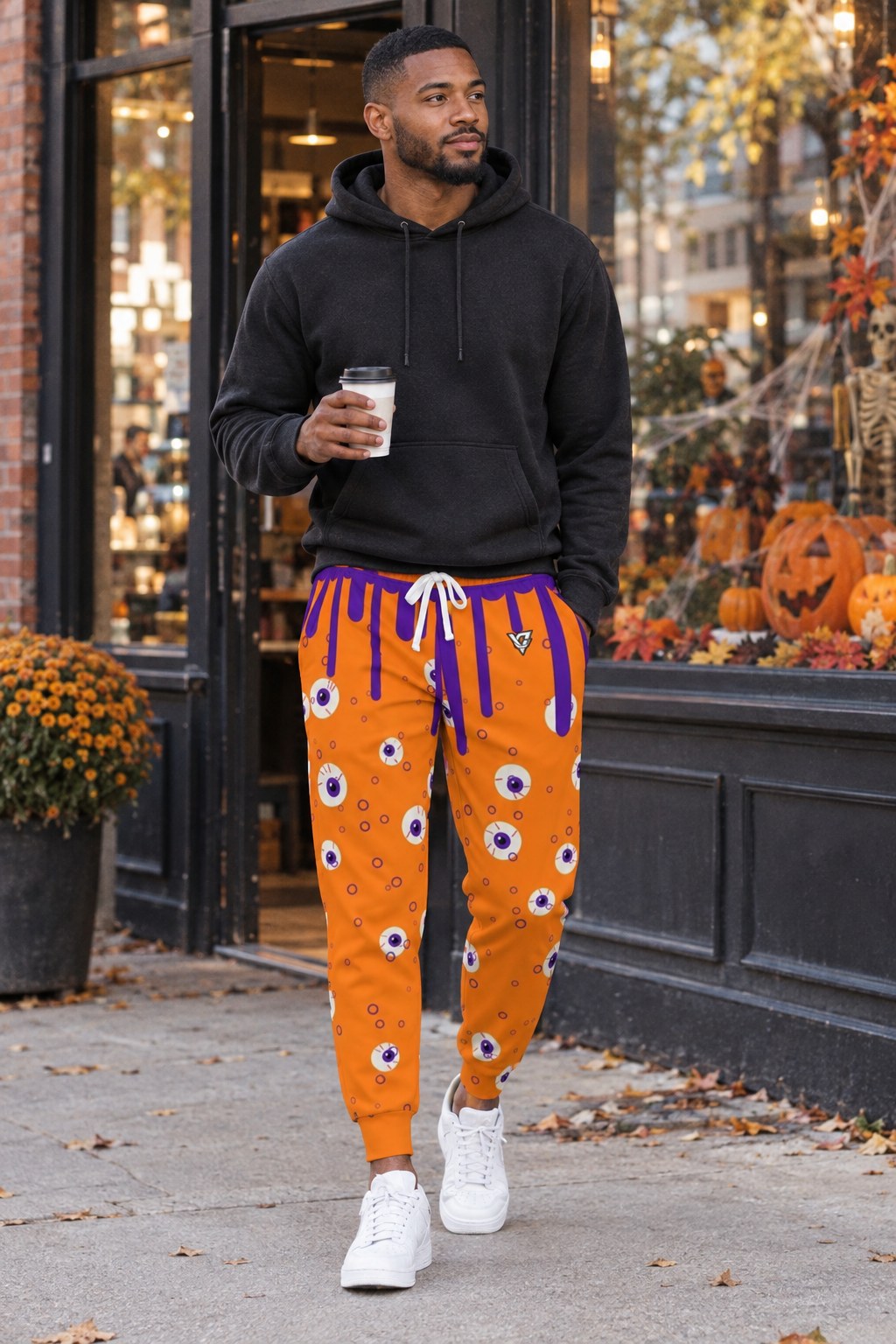 Halloween Pumpkin Orange Slime Drip Men's Joggers worn by a model