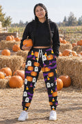 Halloween Midnight Pumpkin Spooky Mix Women's Joggers worn by a model