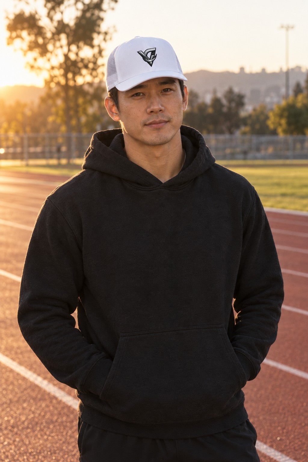 VG Chrome Logo Trucker Cap – front view on a male athlete