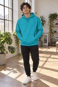 Classic Hoodie | Pullover – front view on a male athlete