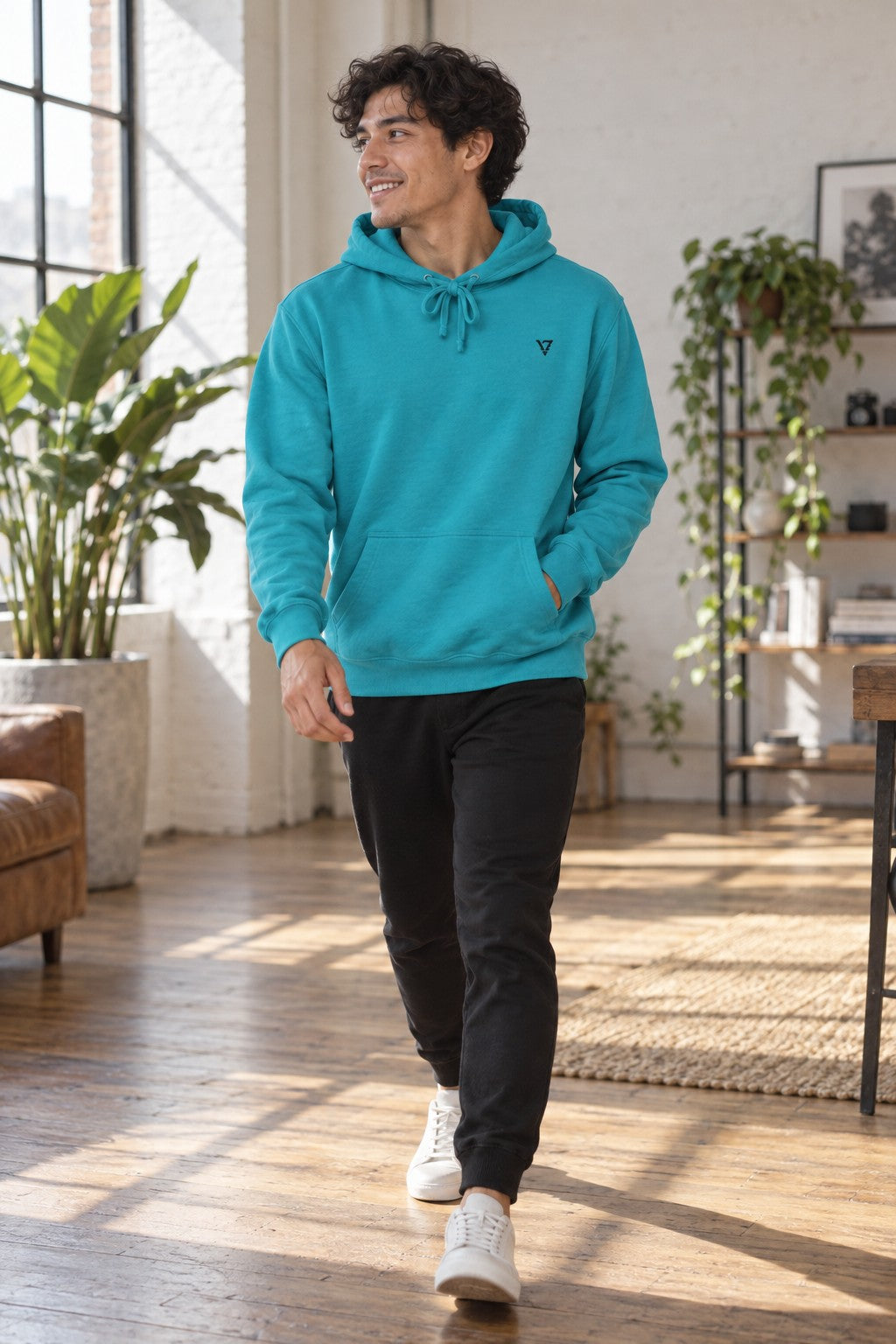 Classic Hoodie | Pullover – side view on a male athlete