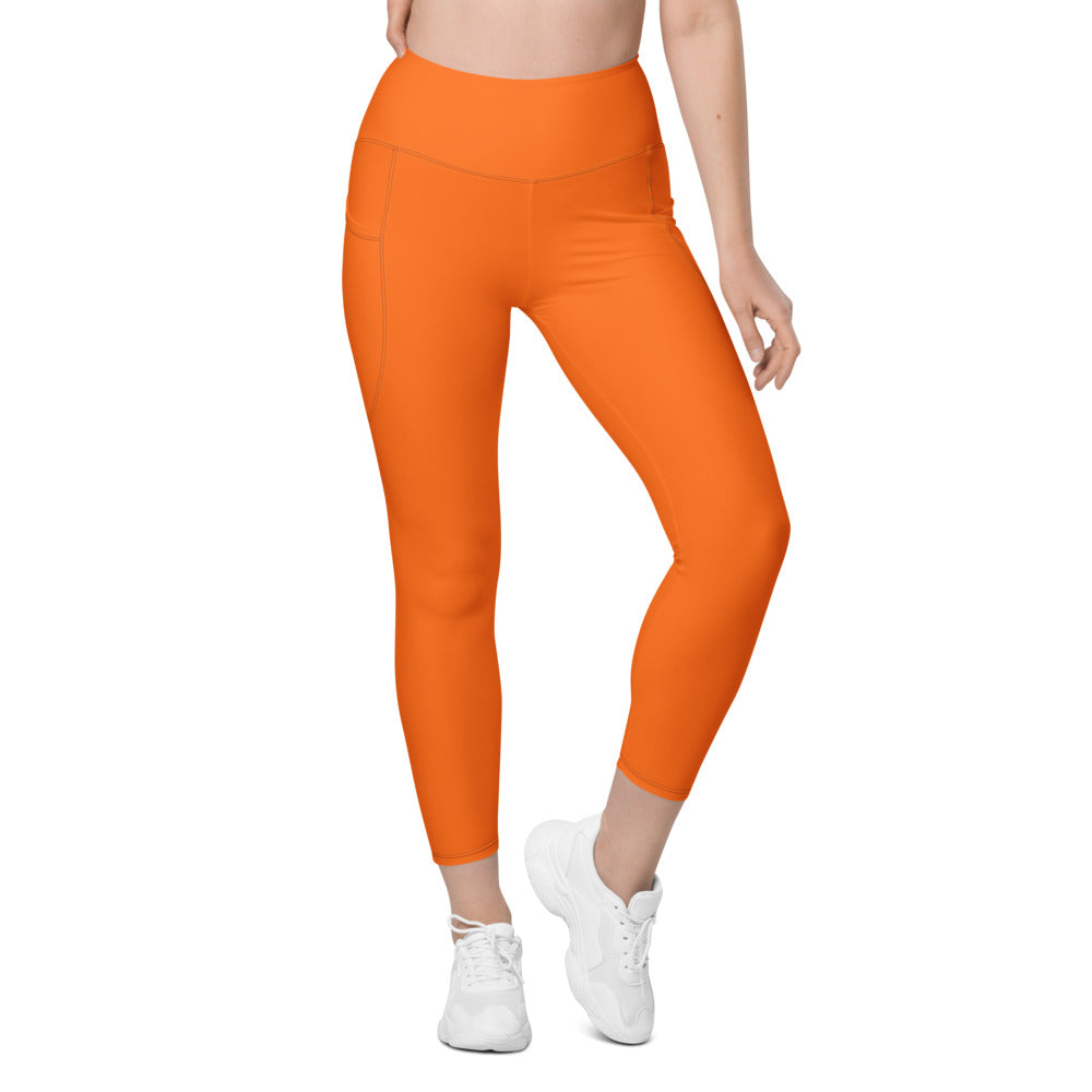 Blaze Orange Essential leggings with pockets, Printful supplier front mockup