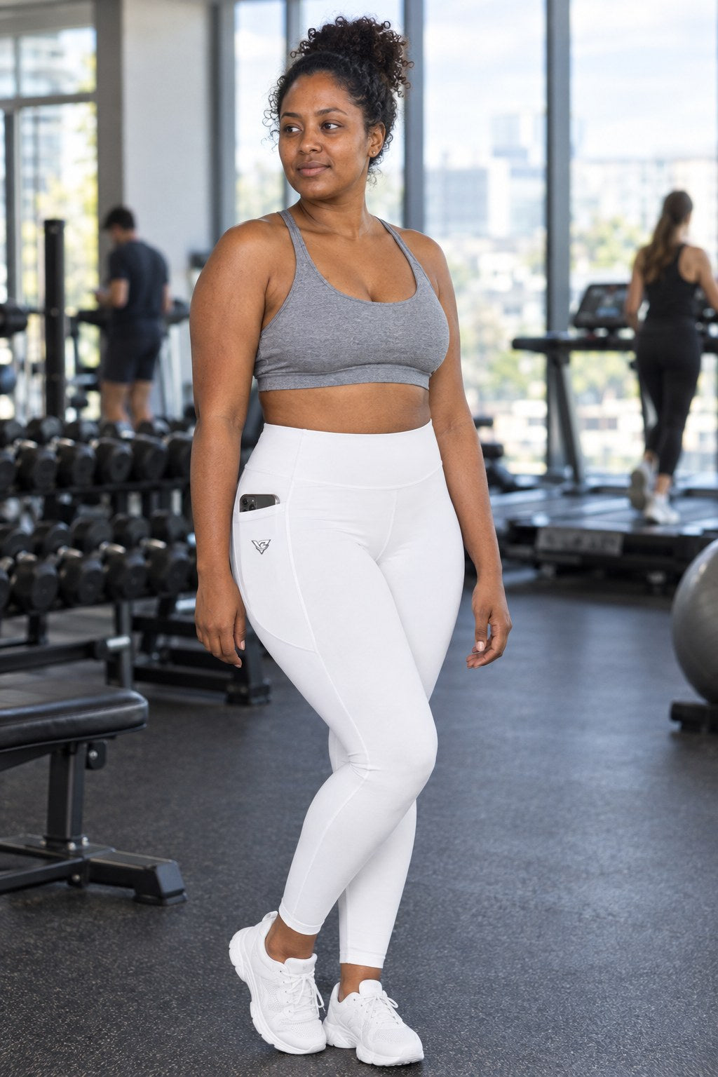 Arctic White Essential leggings with pockets, AI-generated fictional adult model – front three-quarter view showing the side pocket