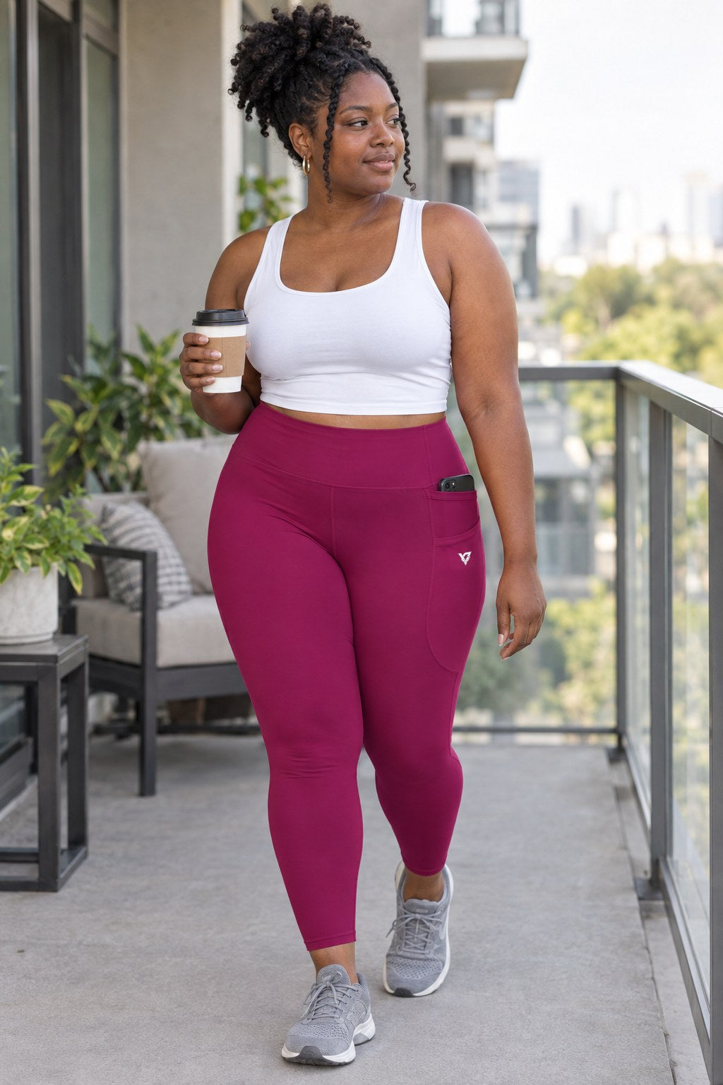 Berry Essential leggings with pockets, AI-generated fictional adult model – front three-quarter view showing the side pocket