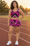 Woman wearing the Magenta Streak women's crop tank and pocket shorts matching set by Vantacore Athletics