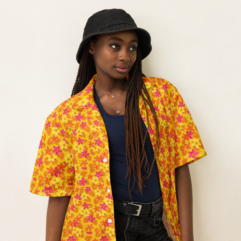 Tropic Heat Plumeria button-up shirt on a woman, three-quarter view