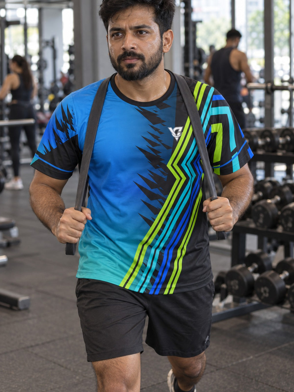 Man training in the Ocean Surge men's sports jersey with the Vantacore V emblem on the left chest – front view