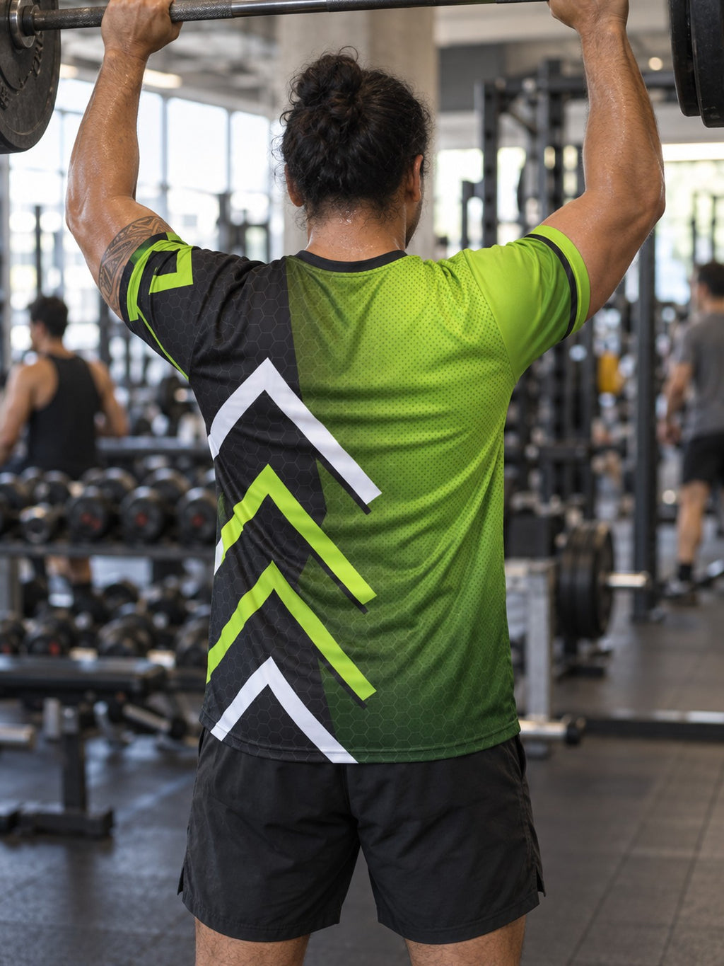 Man training in the Volt Strike men's sports jersey with the Vantacore V emblem on the left chest – back view