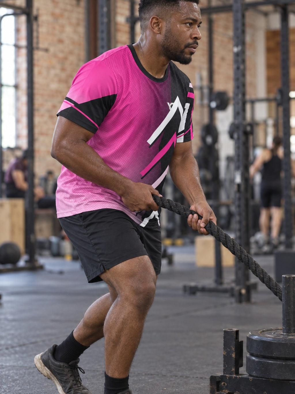 Man training in the Neon Fusion Hex men's sports jersey with the Vantacore V emblem on the left chest – side view