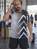Man training in the Monochrome Apex men's sports jersey with the Vantacore V emblem on the left chest – front view