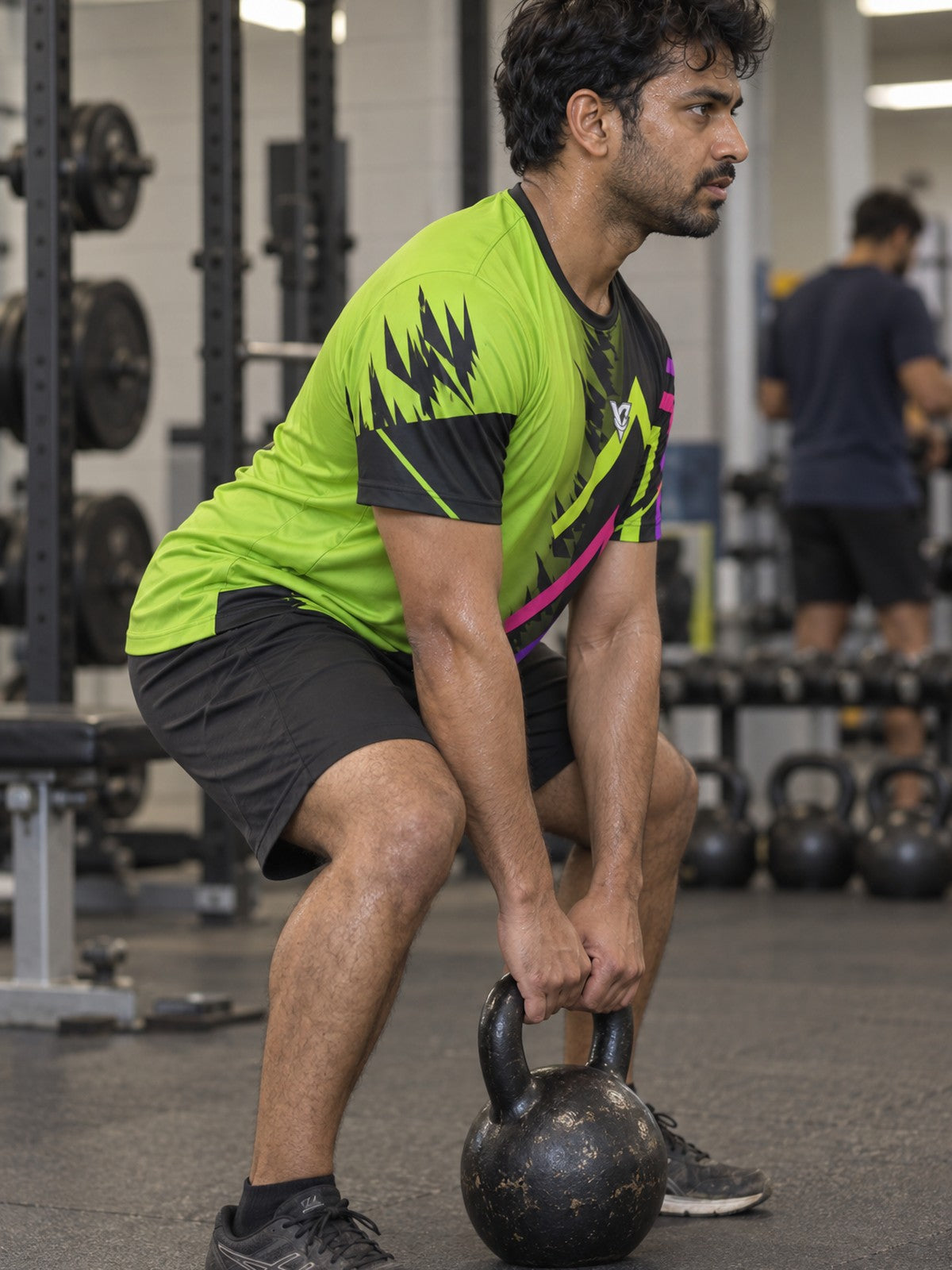 Man training in the Volt Fusion men's sports jersey with the Vantacore V emblem on the left chest – side view