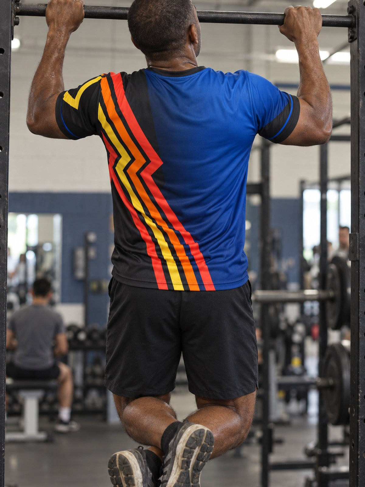 Man training in the Midnight Horizon men's sports jersey with the Vantacore V emblem on the left chest – back view