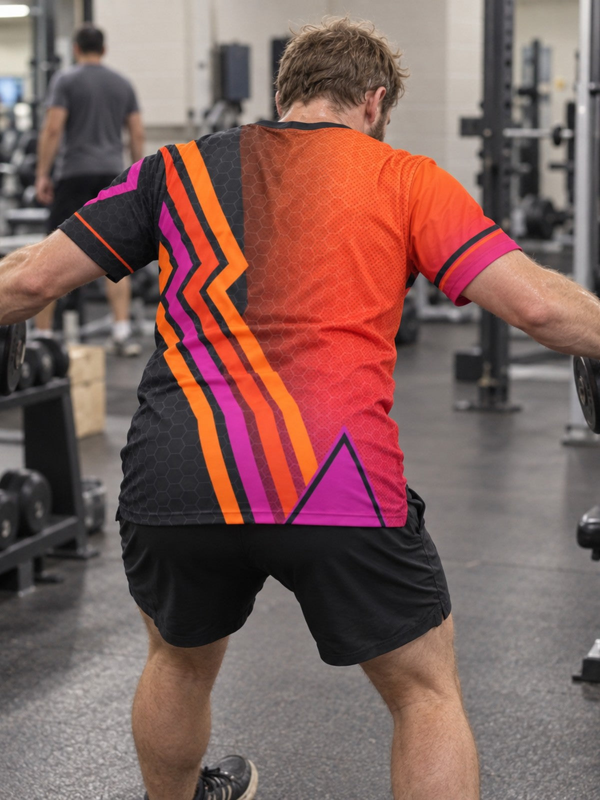 Man training in the Sunset Fusion men's sports jersey with the Vantacore V emblem on the left chest – back view