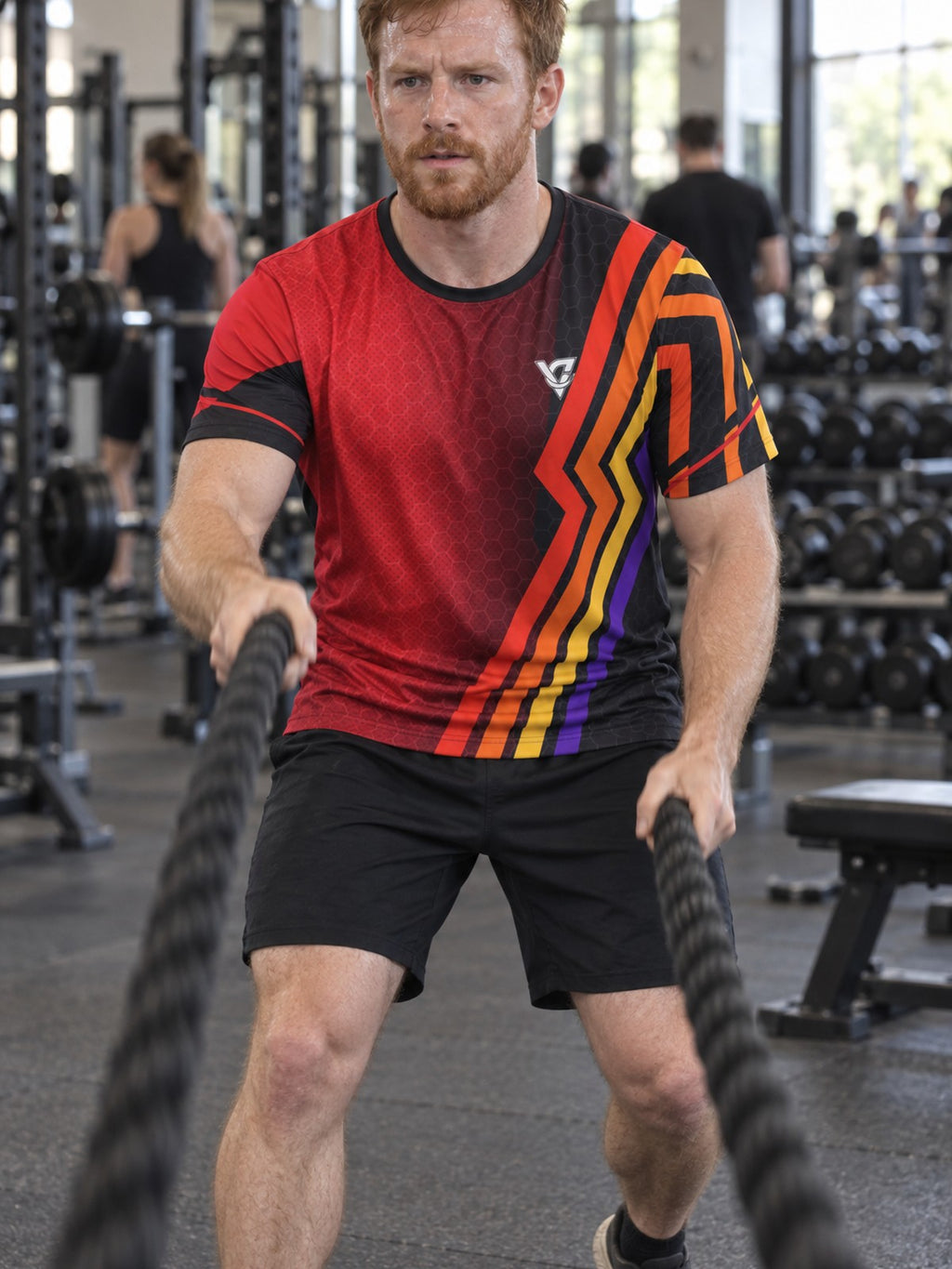 Man training in the Crimson Ember men's sports jersey with the Vantacore V emblem on the left chest – front view