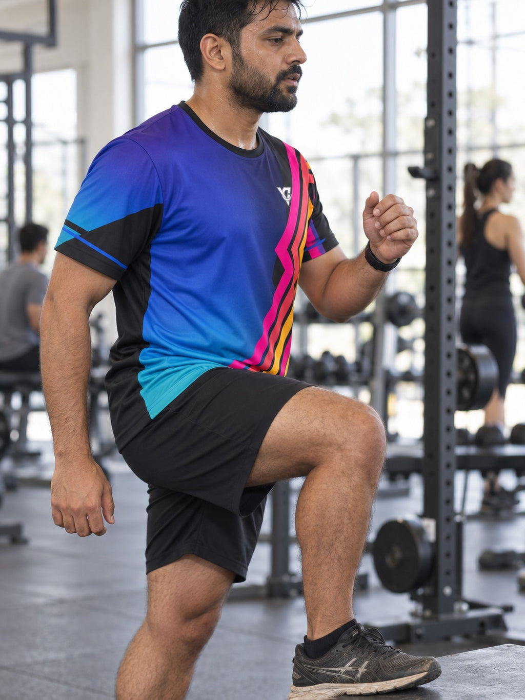 Man training in the Spectrum Rush men's sports jersey with the Vantacore V emblem on the left chest – side view