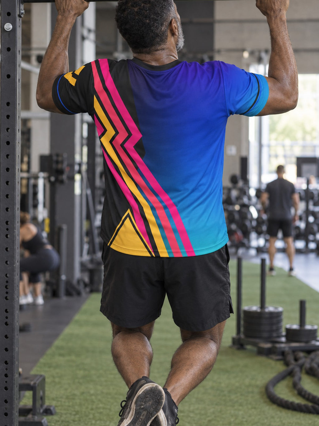 Man training in the Spectrum Rush men's sports jersey with the Vantacore V emblem on the left chest – back view