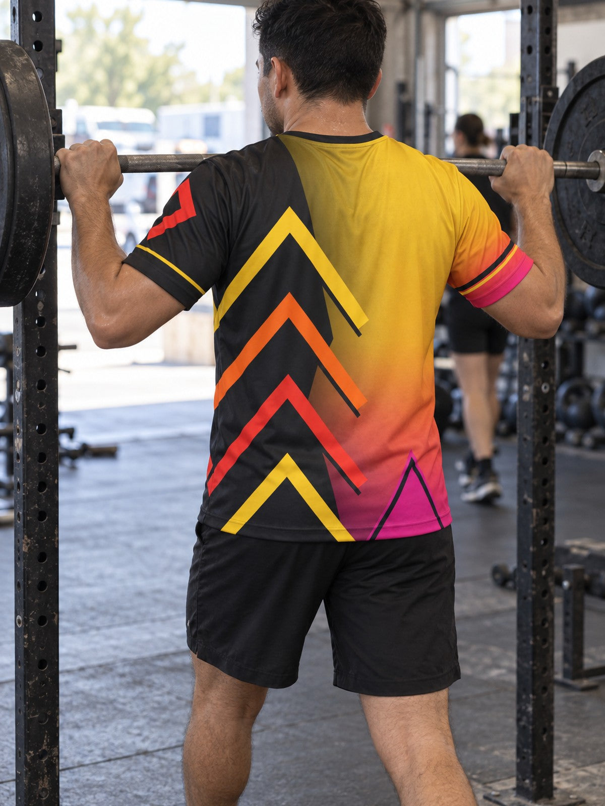 Man training in the Solar Pulse men's sports jersey with the Vantacore V emblem on the left chest – back view