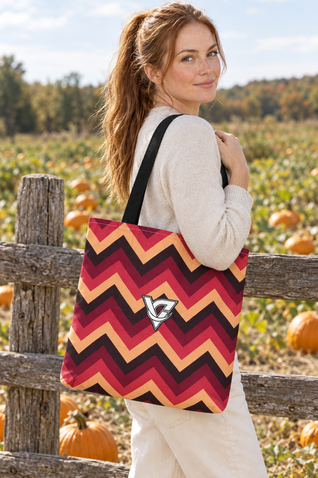 Cranberry Chevron tote bag worn on a model