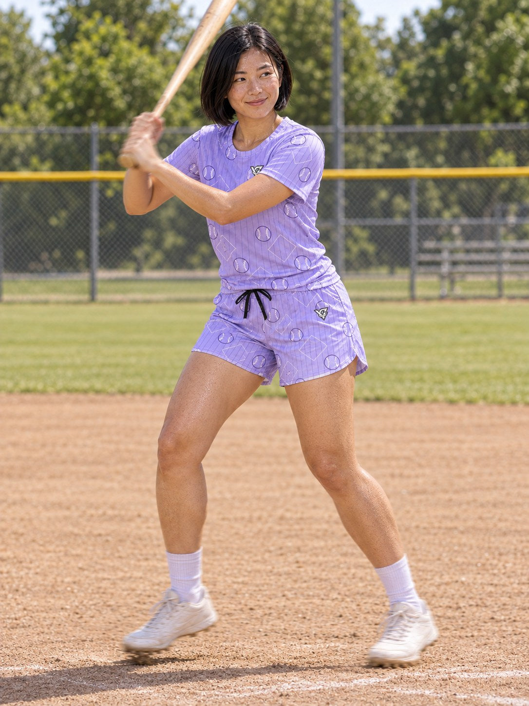 Baseball & Softball Lavender Mist Diamond Stitch Women's Athletic Shorts with Pockets, in action
