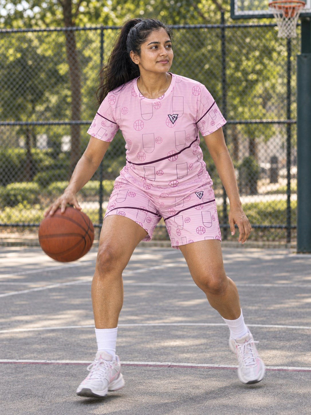 Basketball Blush Rose Court Seam Women's Athletic Shorts with Pockets, in action