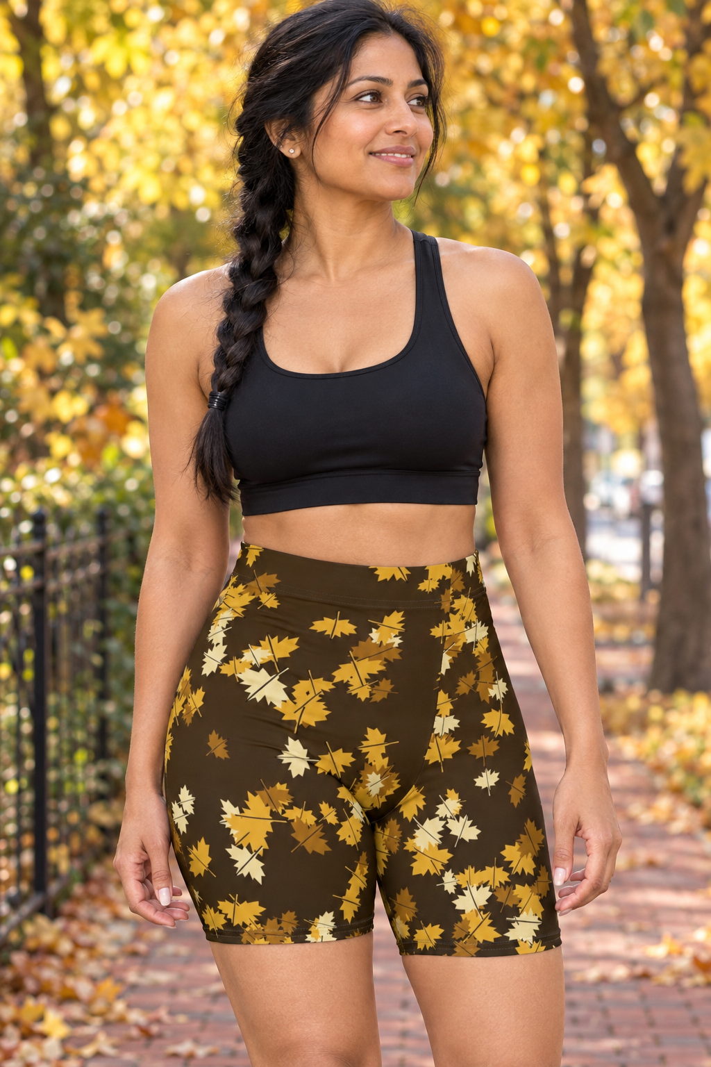 Harvest Gold Falling Leaves women's high-waisted, skin-tight biker shorts worn on a model