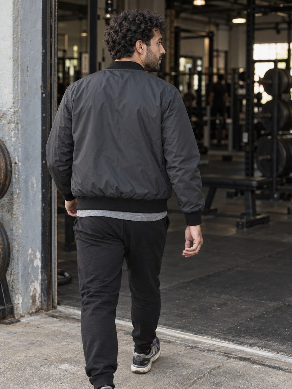 Built Different bomber jacket in charcoal – back view