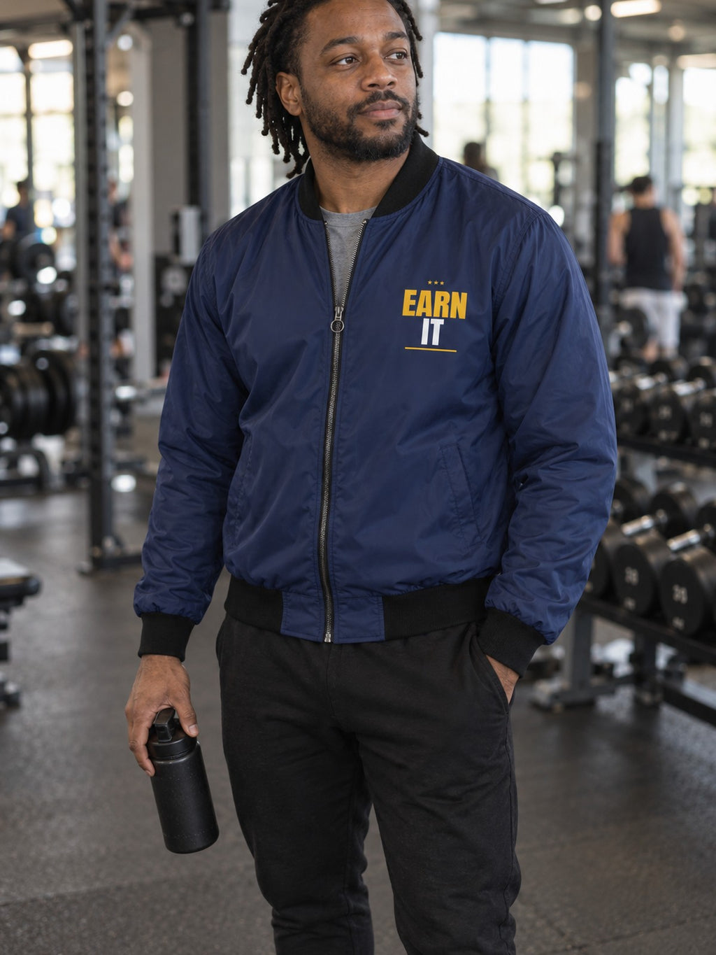 Earn It bomber jacket in navy – front
