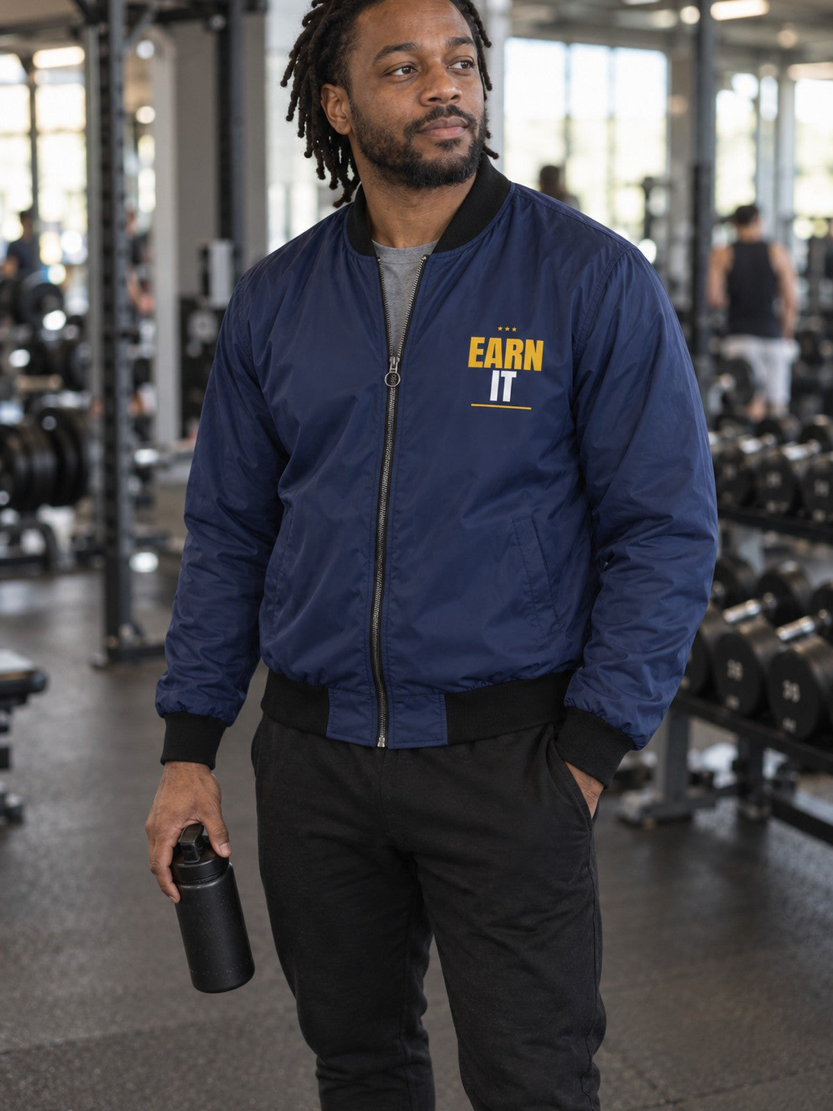 Earn It bomber jacket in navy – front