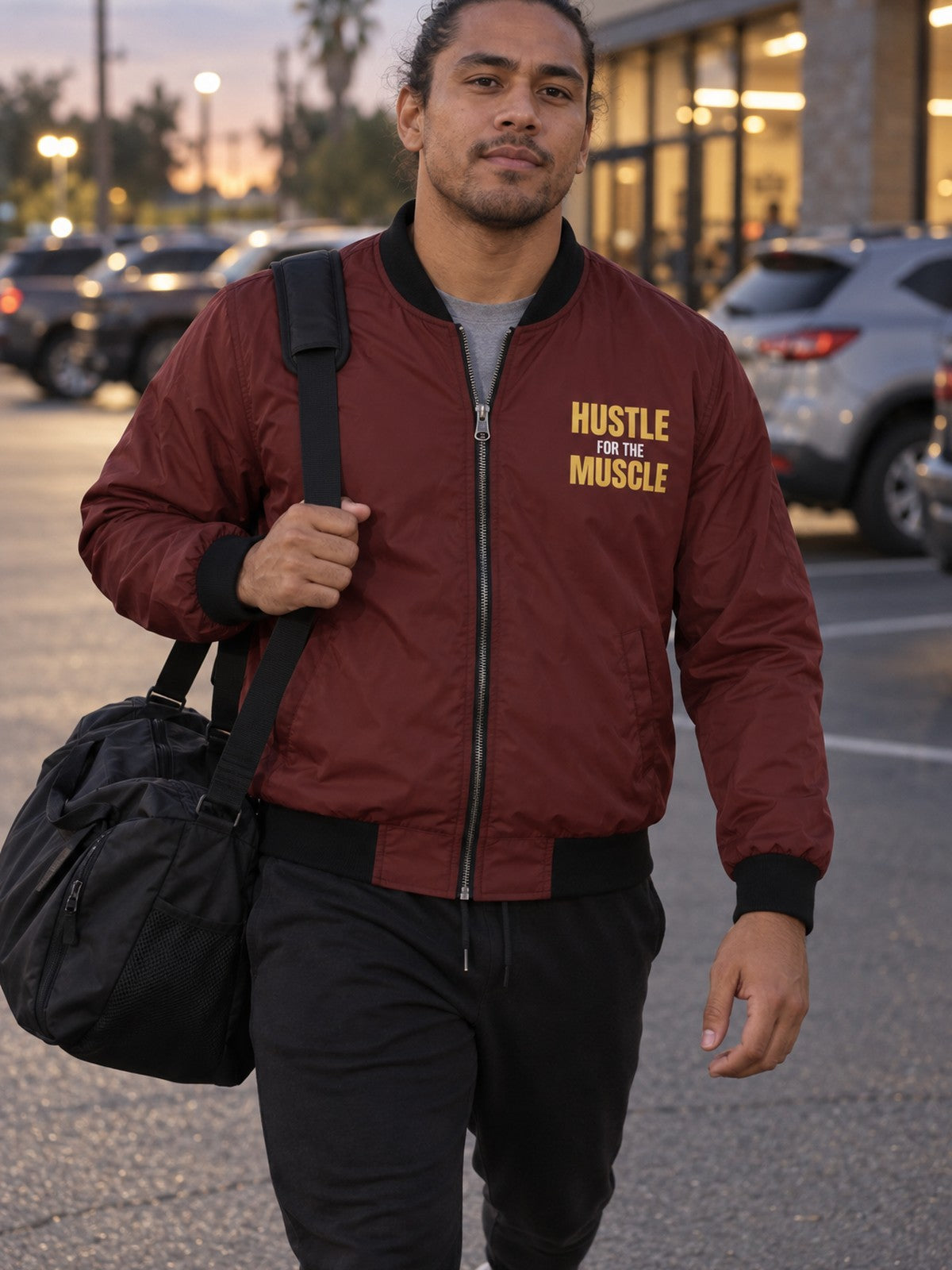 Hustle for the Muscle bomber jacket in maroon – front
