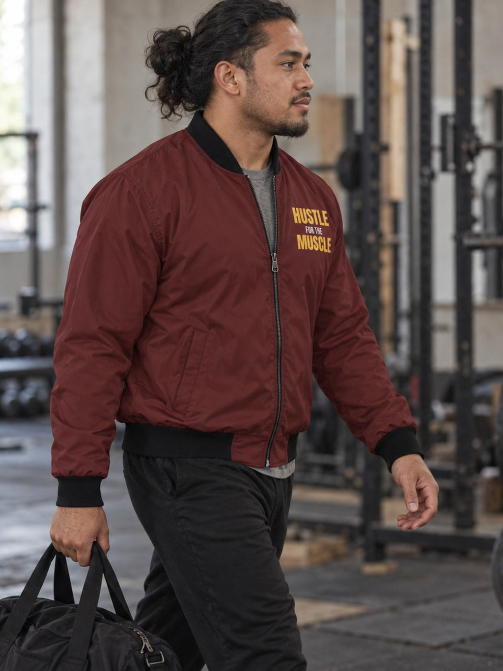 Hustle for the Muscle bomber jacket in maroon – side view
