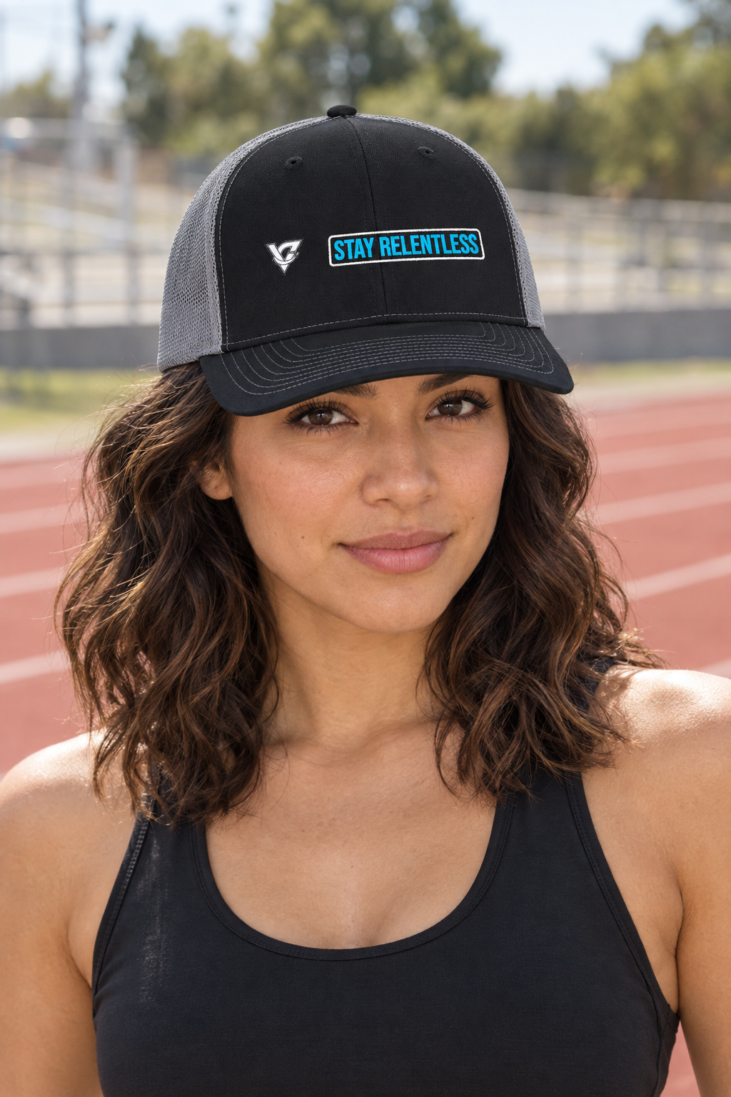 Stay Relentless structured trucker snapback cap with a mesh back worn on a model