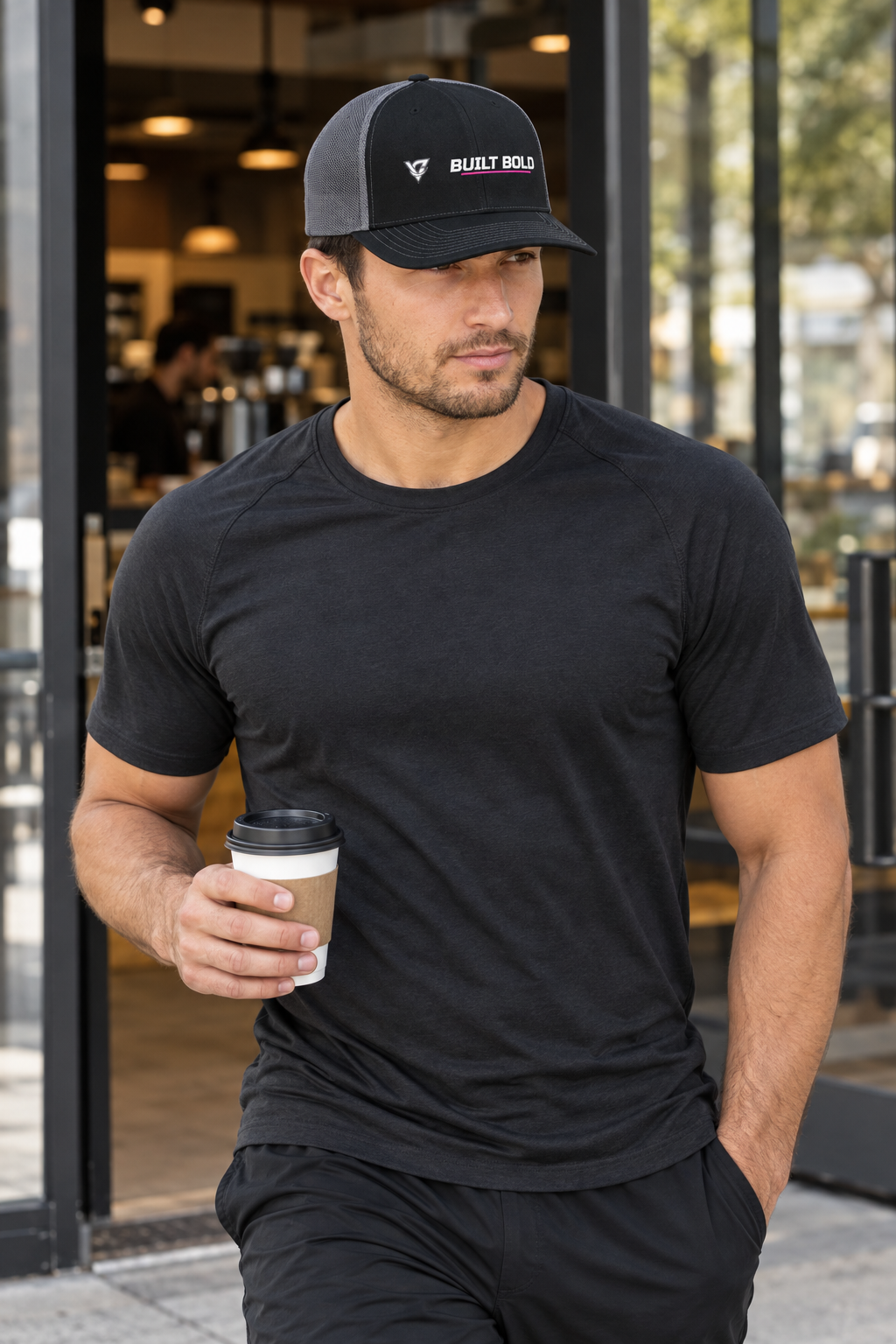 Built Bold structured trucker snapback cap with a mesh back worn on a model