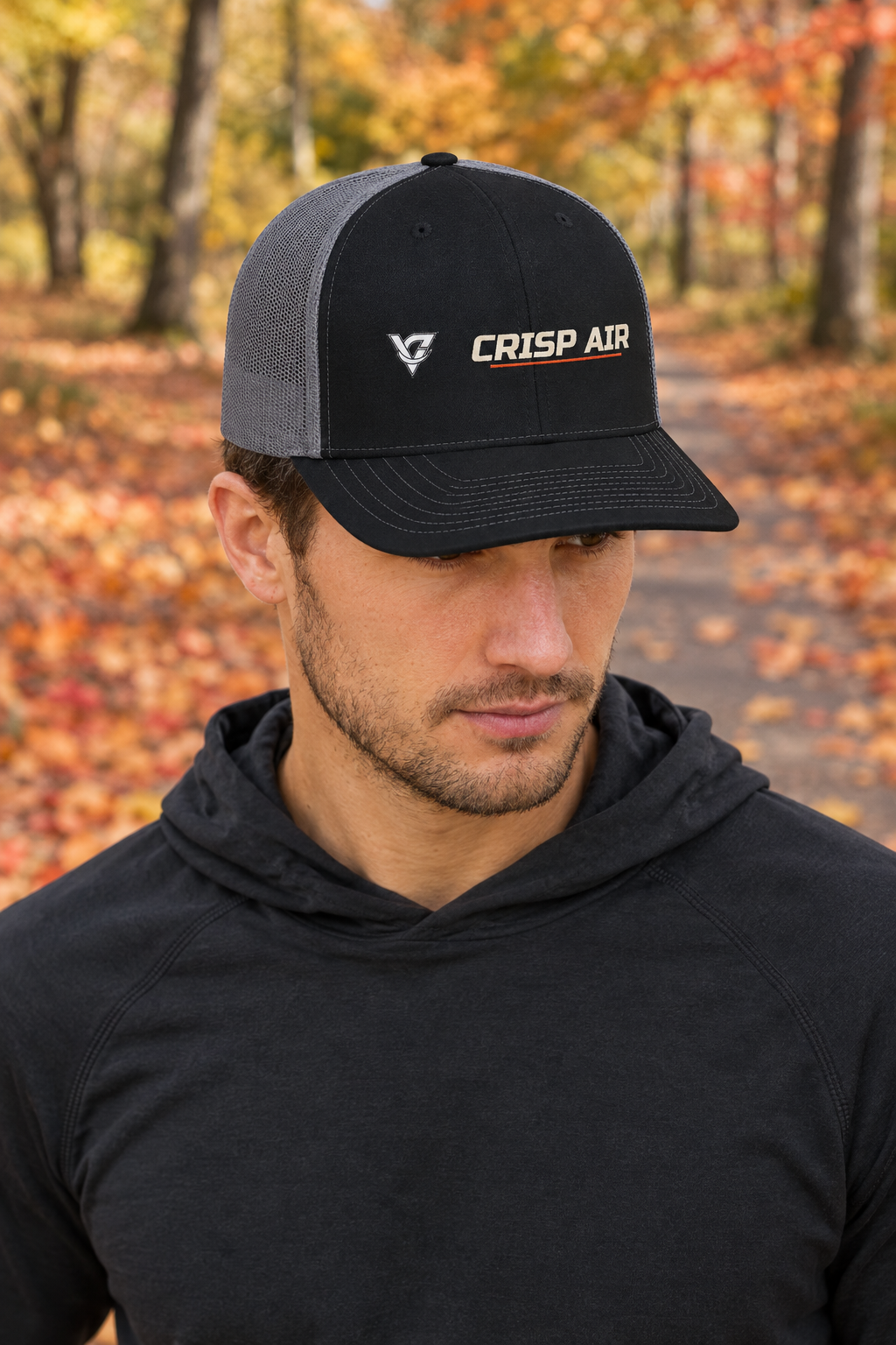 Crisp Air structured trucker snapback cap with a mesh back worn on a model