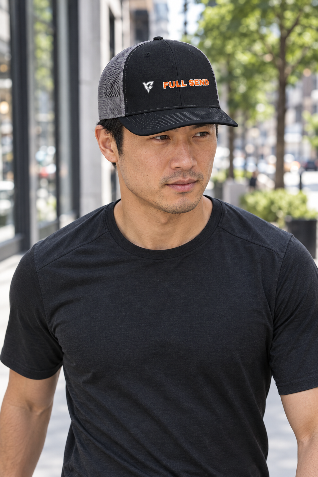 Full Send structured trucker snapback cap with a mesh back worn on a model