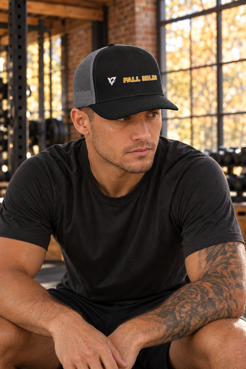 Fall Miles structured trucker snapback cap with a mesh back worn on a model