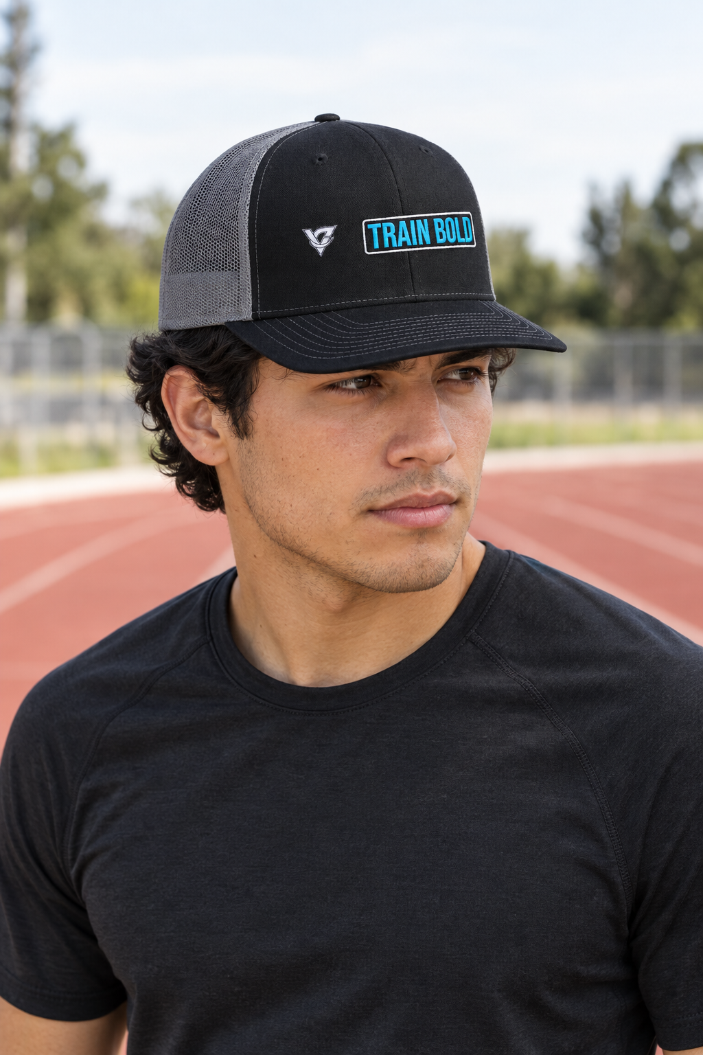 Train Bold structured trucker snapback cap with a mesh back worn on a model