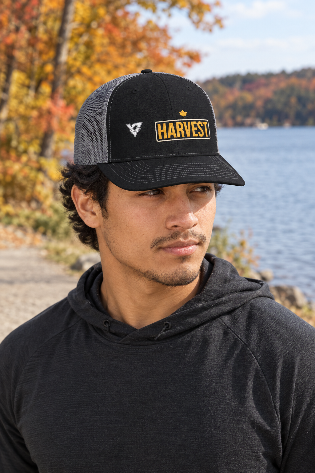 Harvest structured trucker snapback cap with a mesh back worn on a model
