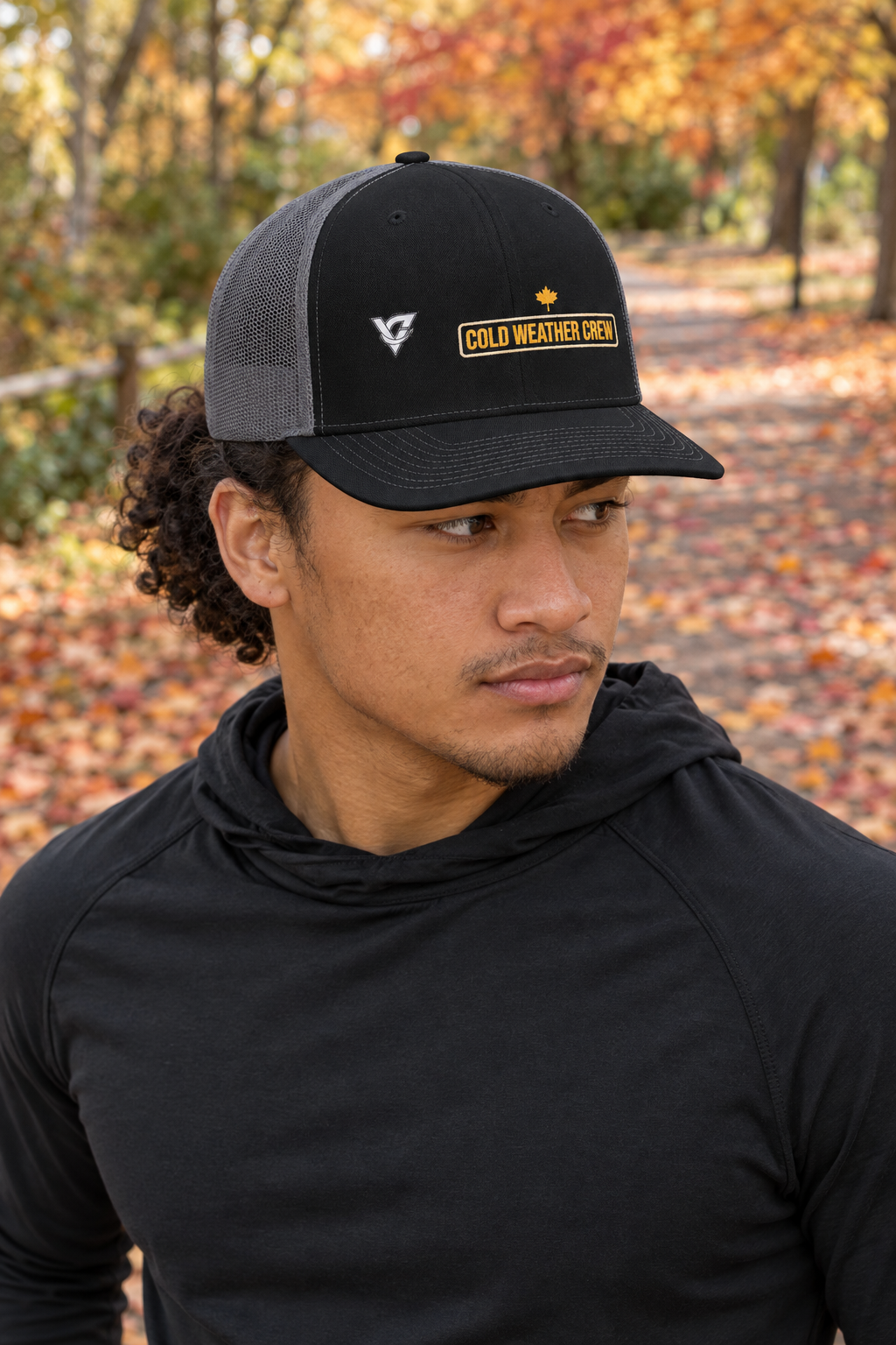 Cold Weather Crew structured trucker snapback cap with a mesh back worn on a model
