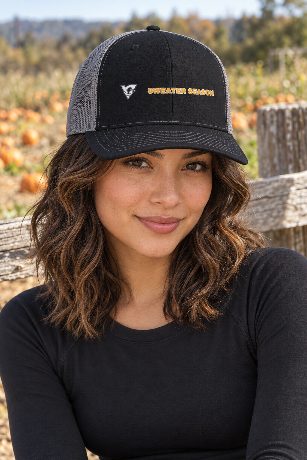 Sweater Season structured trucker snapback cap with a mesh back worn on a model