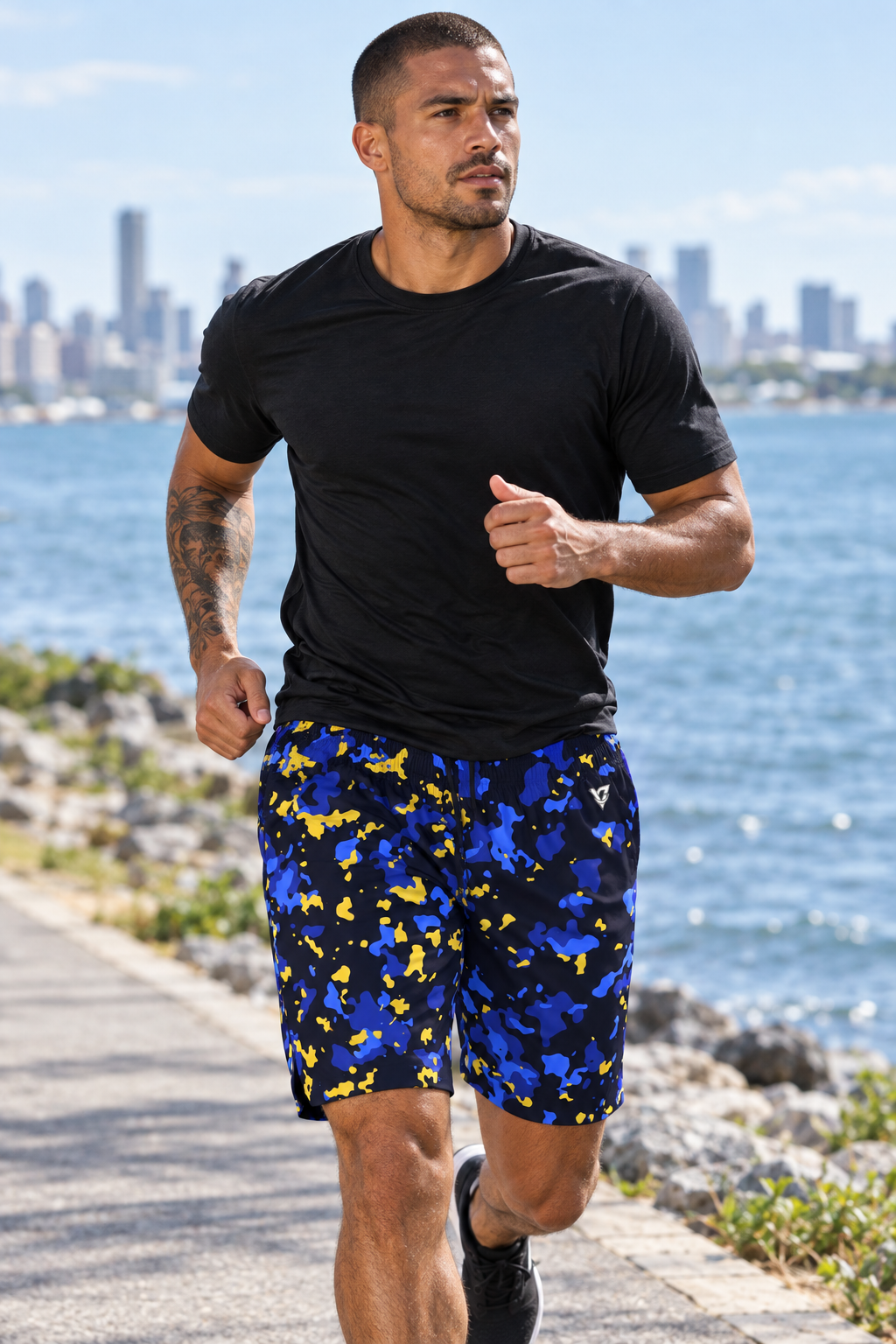 Royal Splatter men's athletic jogger shorts worn on a model