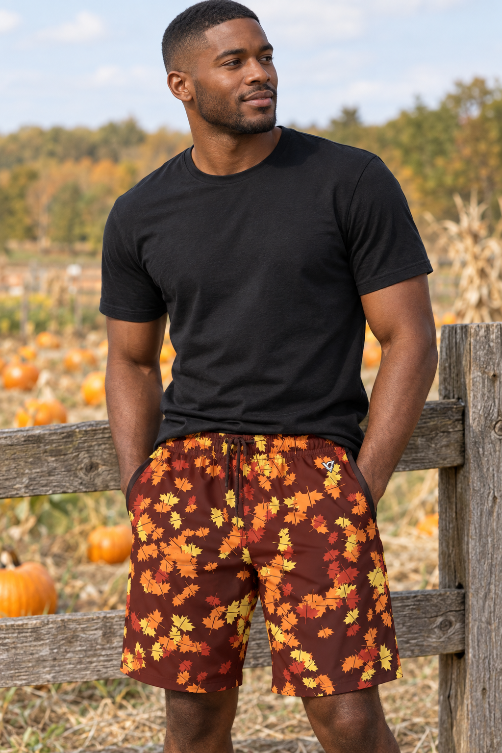 Sunset Orchard Falling Leaves men's athletic jogger shorts worn on a model