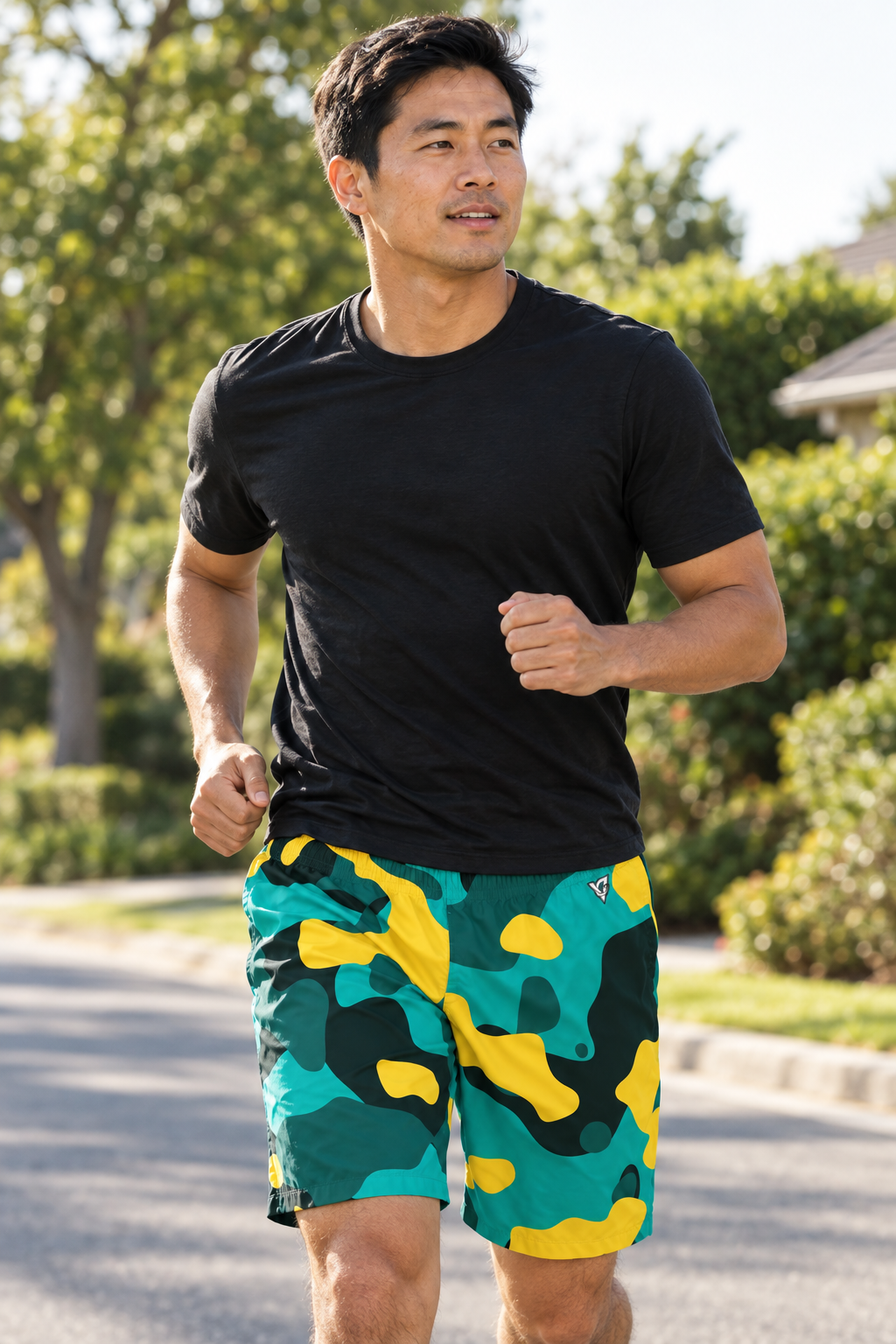Tropic Camo men's athletic jogger shorts worn on a model