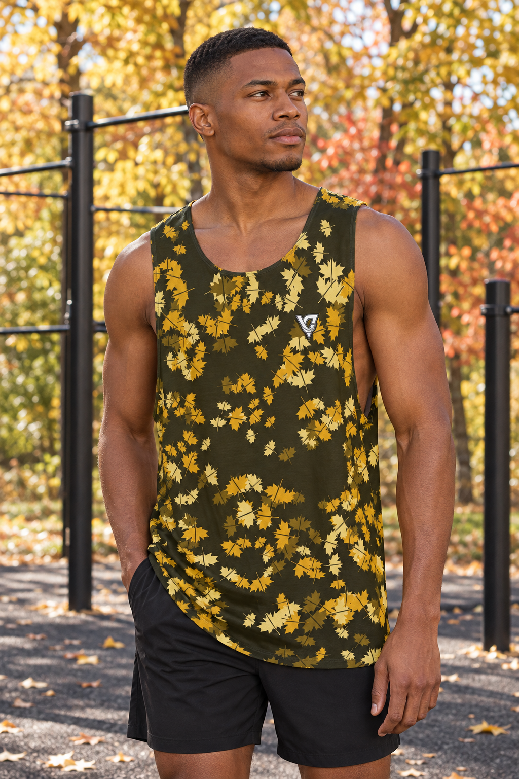 Mustard Falling Leaves men's loose athletic tank top worn on a model