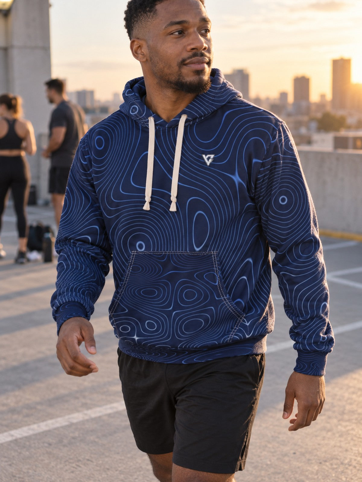 Man wearing the Cobalt Topo Men's Pullover Hoodie